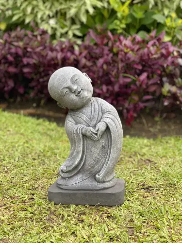 Product image of the product “Ling - Monk, standing, bent sideways, 34 cm H | cast stone ”
