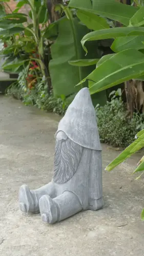 Product image of the product “Klaus - Sitting Wizard, 41cm H | cast stone ”