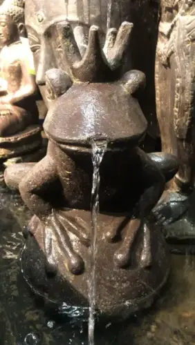 Product image of the product “Frog king with crown sitting on a ball as a water feature. 55cm high. Painted in the color antique finish ”