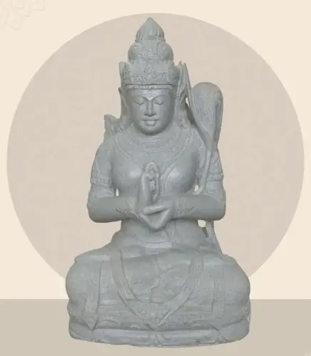 Product image of the product “Seated Dewi Sri, position chakra turning the wheel, 73cm high riverstone grey, model with sativa. There is a stone eye on the left temple. ”