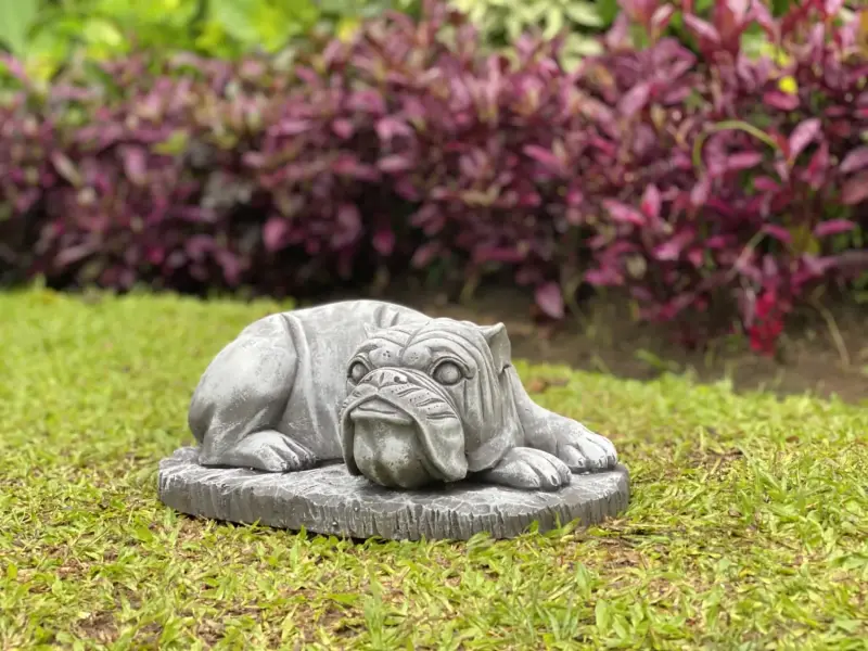 Product image 1 of the product “Spike -Small bulldog lying on Base, 38cm L | cast stone ”
