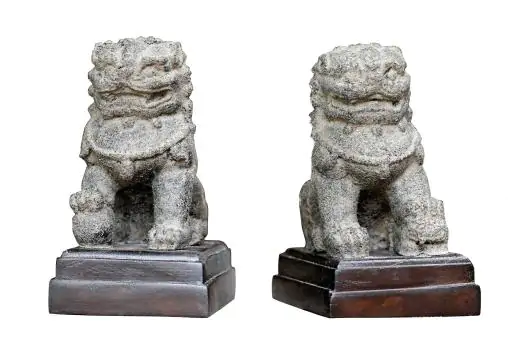 Product image 1 of the product “Sculpted temple lions, each on a wooden base, stone shape / carved with teak, handmade. The height is 10 cm. Painted in the color antique finish ”
