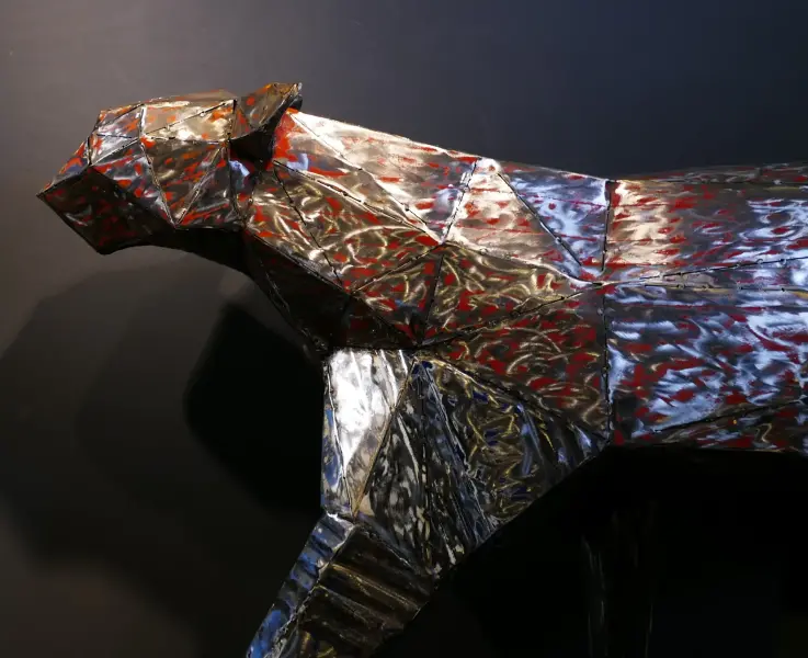 Product image 1 of the product “Walking Panther, 190cm length, sculpture from upcyceled oil barrel. ”