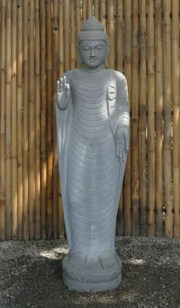 Product image 1 of the product “Standing Indian Buddha - gesture of fearlessness, Regular cape and Pattern cape models, in the sizes from 120cm to 175cm, Natural finish ”