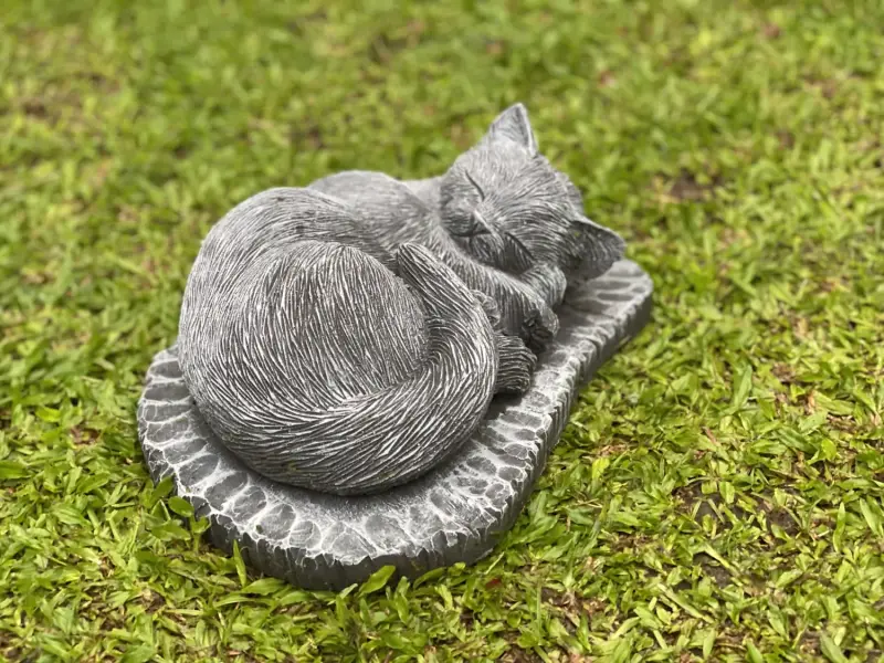Product image of the product “Lilith -Lying cat on pedestal, 33cm L | cast stone ”