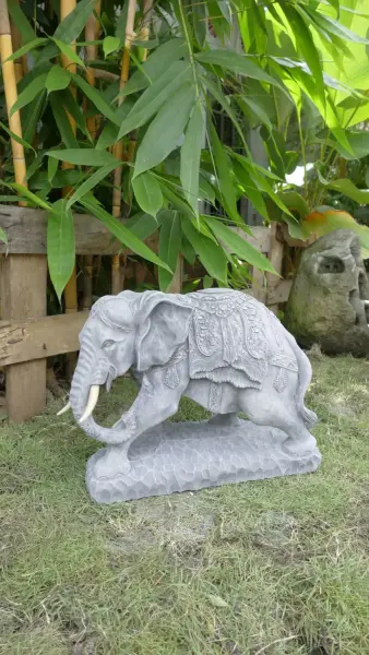Product image of the product “Indra - Small Elephant bending to the left, 46.5cm L | cast stone ”