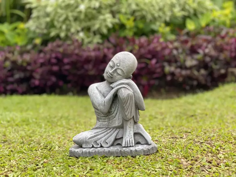 Product image of the product “Amal - Buddha relax - left knee up. 24cm H | cast stone ”