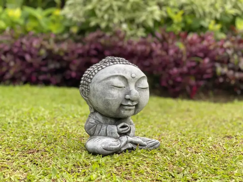 Product image of the product “Nima - Sitting monk with big head, 30 cm H | cast stone ”