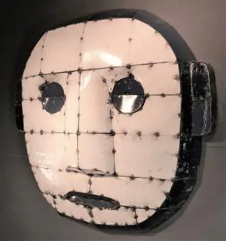 Product image of the product “Large Mask  - Modell 8, 115cm height, original color outside. Sculpture from upcyceled oil barrel. ”