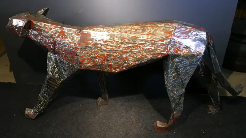 Product image of the product “Walking Panther, 190cm length, sculpture from upcyceled oil barrel. ”