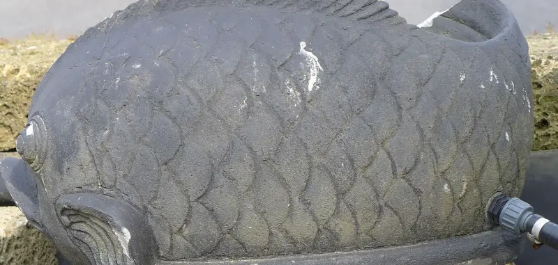 Product image of the product “Fish on base as water feature, 60 cm L | Cast stone, handcrafted & coloured ”