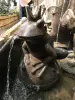 Product image 6 of the product “Frog king with crown sitting on a ball as a water feature. 55cm high. Painted in the color antique finish ”