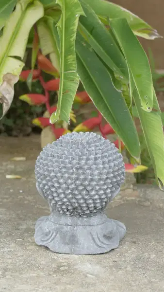 Product image 6 of the product “Nima - Sitting monk with big head, 15 cm H | cast stone ”