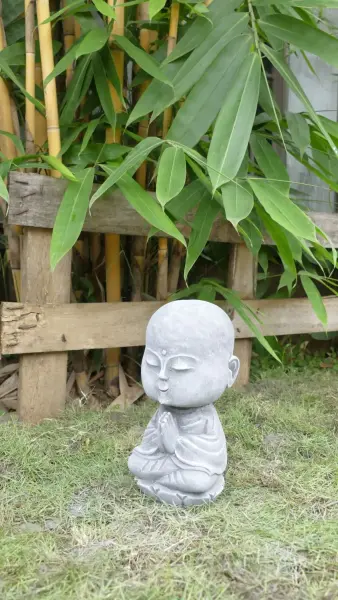 Product image 6 of the product “Ishaan - Sitting Monk Big Head, 29.5cm Height | cast stone ”